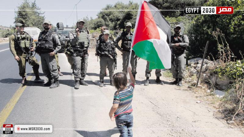 علم فلسطين أمام جيش الاحتلال