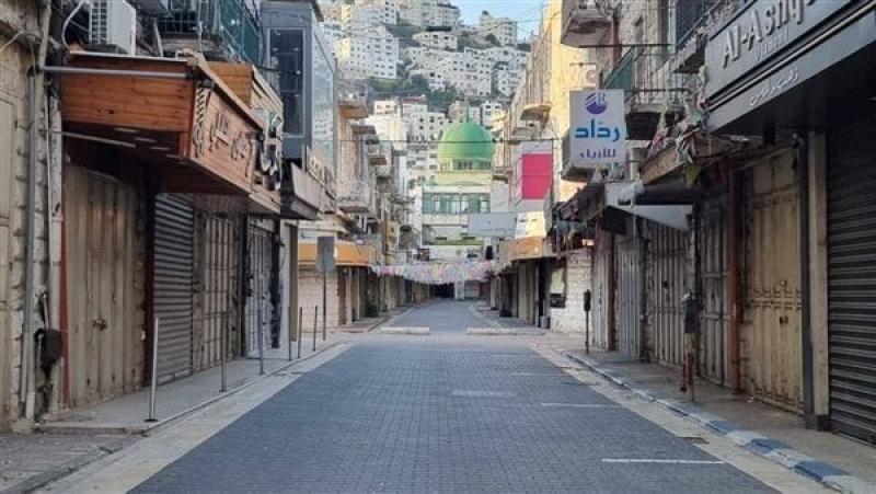 إضراب شامل بالضفة الغربية حداداً على شهداء مجزرة مخيم طولكرم