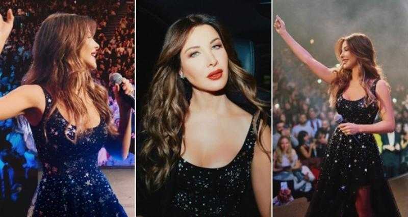 نانسي عجرم بفستان أسود من التول مزين بالنجوم في حفلها في باريس